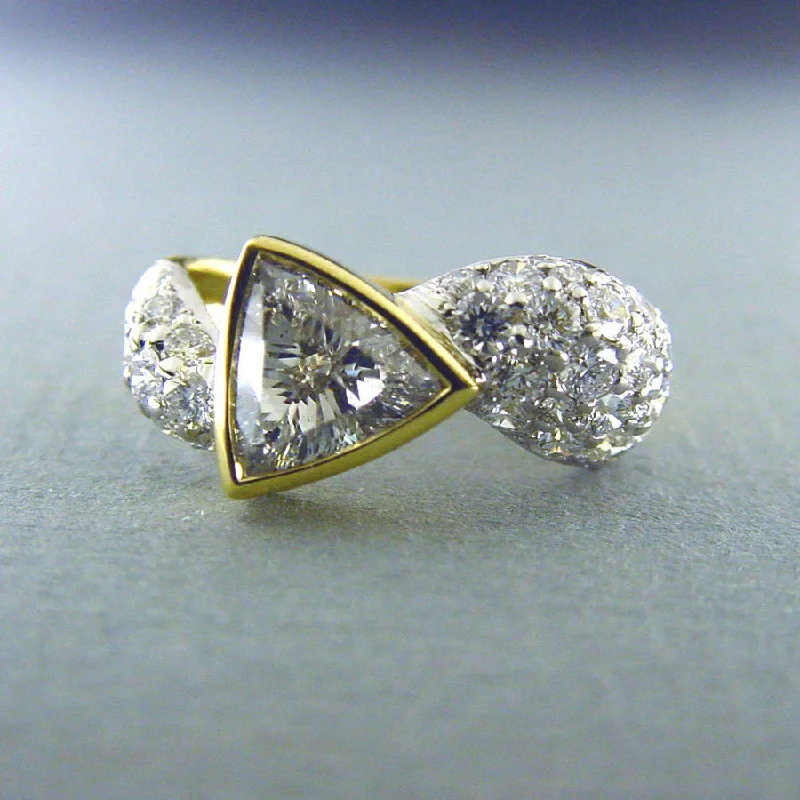 Trillion Cut Diamond and Round Diamond Ring