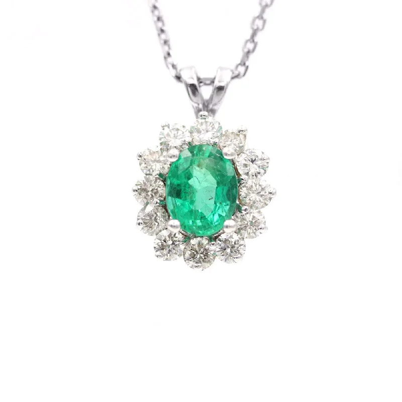 Oval Emerald And Diamond Halo Pendant