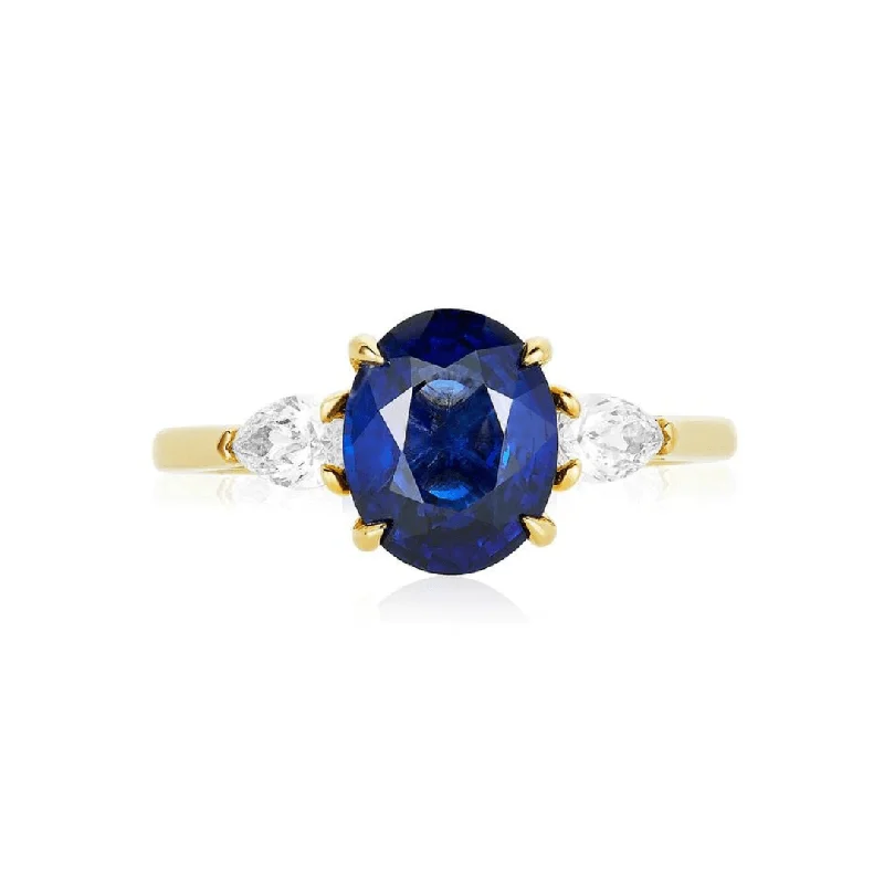 Oval Cut Sapphire with Pear Cut Diamond Side Stones