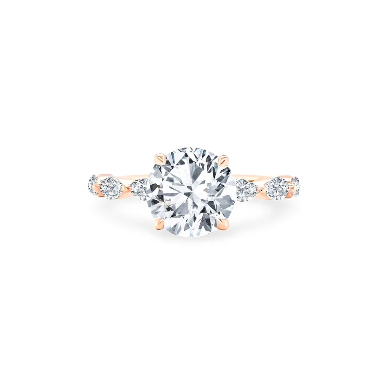 Round Solitaire on Marquise Cut Band