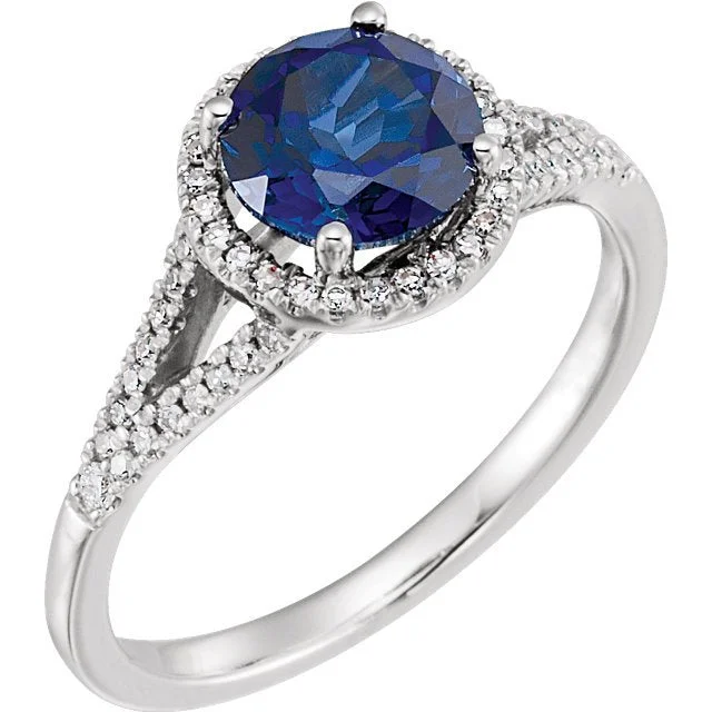 14KT WHITE GOLD 1.85 CT LAB CREATED BLUE SAPPHIRE & 1/6 CTW DIAMOND HALO RING