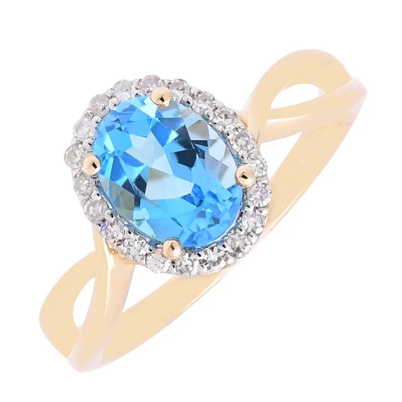 Oval Blue Topaz Ring in 14kt Yellow Gold with Diamonds (1/7ct tw)