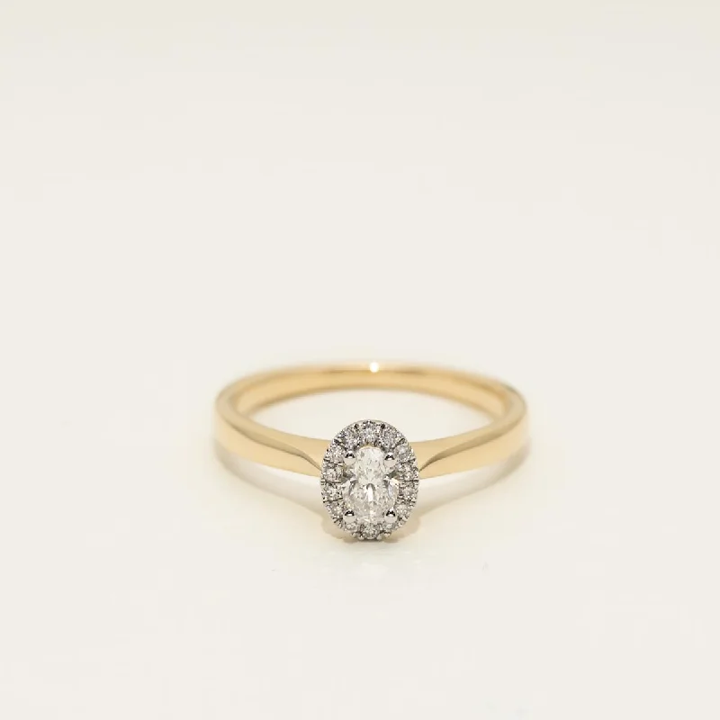 Oval Diamond Halo Engagement Ring in 14kt Yellow Gold (1/3ct tw)